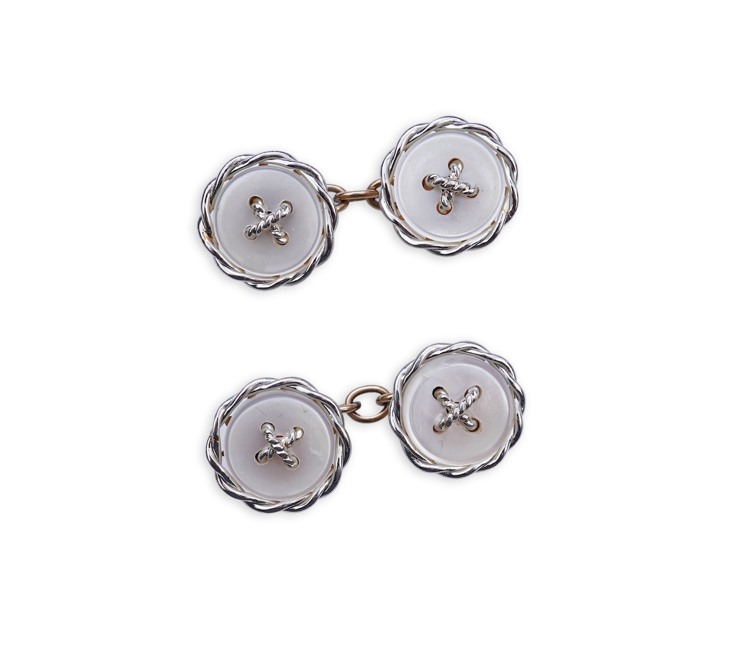 A pair of mother of pearl cufflinks, early 20th century